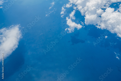 Wallpaper Mural Aerial view scene of the sea or ocean which hiding under white fluffy clouds. Torontodigital.ca