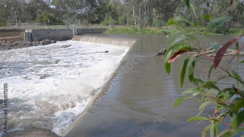 Wallpaper Mural Waterfall flowing over rocky weir on river in Yarra Bend Park, Melbourne, Australia Torontodigital.ca