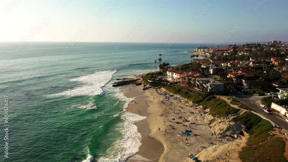 People at Windansea Beach in La Jolla. Aerial flying forward People at Windansea Beach in La Jolla. Aerial flying forward