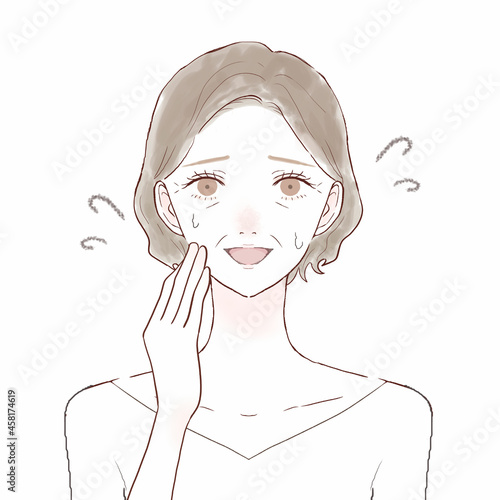 愛想笑いをしている中年女性