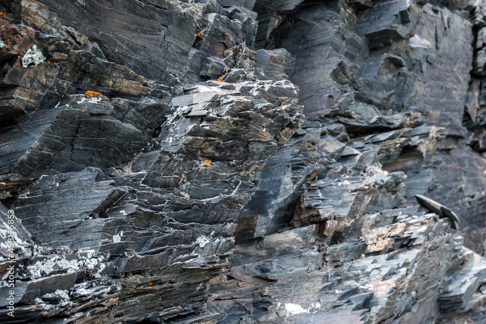 Beautiful rock texture with cracks and visible layers of rocks. Natural abstract landscape background. Texture, background, pattern. Beautiful rock texture with cracks and visible layers of rocks. Natural abstract landscape background. Texture, background, pattern.