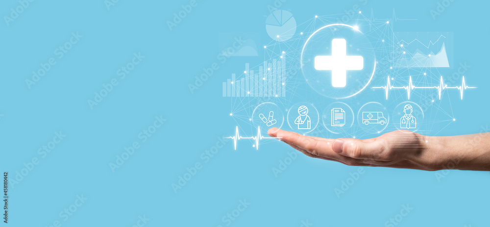 Businessman hold virtual plus medical network connection icons. Covid-19 pandemic develop people awareness and spread attention on their healthcare.Doctor,document,medicine,ambulance,patient icon. Businessman hold virtual plus medical network connection icons. Covid-19 pandemic develop people awareness and spread attention on their healthcare.Doctor,document,medicine,ambulance,patient icon.