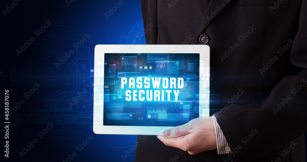 Person holding tablet, security concept Person holding tablet, security concept