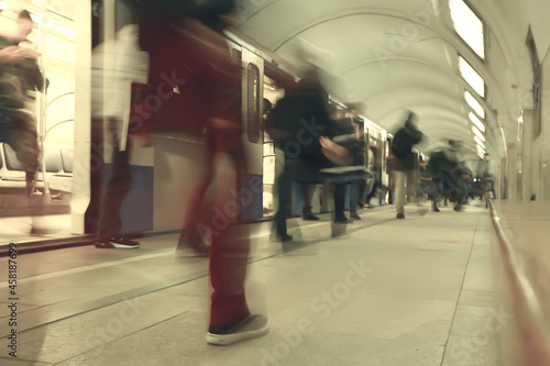 crowd of people metro in motion blurred, abstract background urban traffic people