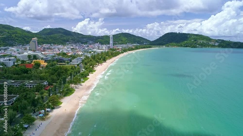 Aerial view Drone camera flying over Patong city Phuket Thailand in the morning Beautiful patong beach in summer season photo