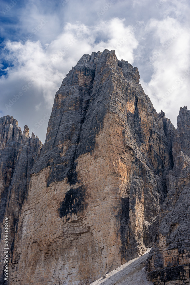 Rock north face of the Drei Zinnen or Tre Cime di Lavaredo (three peaks of Lavaredo), the famous mountain peaks of Dolomites, UNESCO world heritage site, Trentino-Alto Adige, Veneto, Italy, Europe.