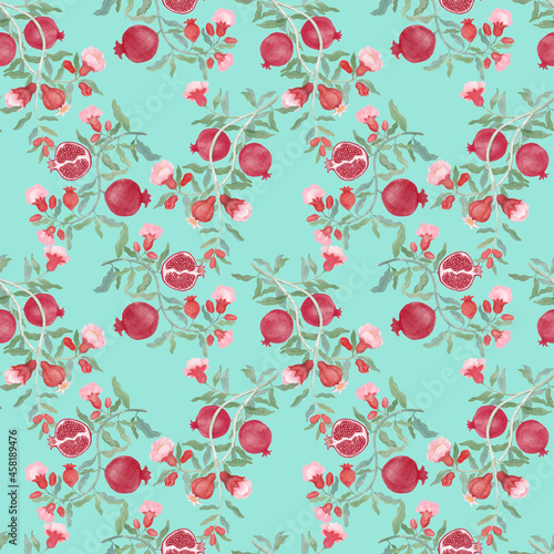 Pomegranate fruit and flower blossom seamless repeated pattern on green