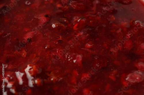 Cranberry sauce all over background, close up