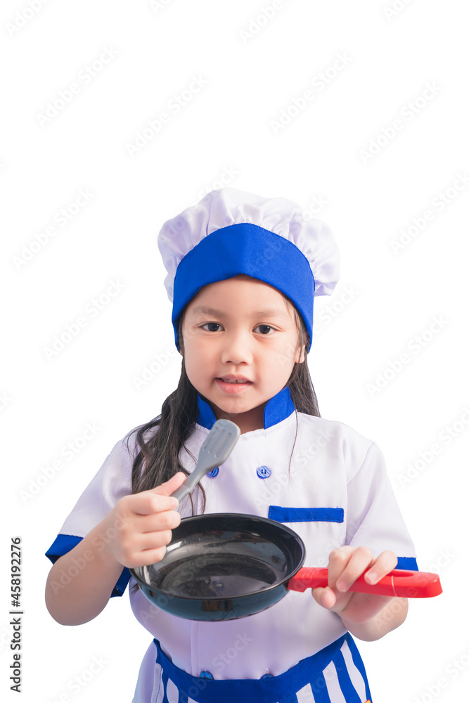 Happy girls with amazing smile in clothes and chef cap. child dreams of becoming a chef Happy girls with amazing smile in clothes and chef cap. child dreams of becoming a chef