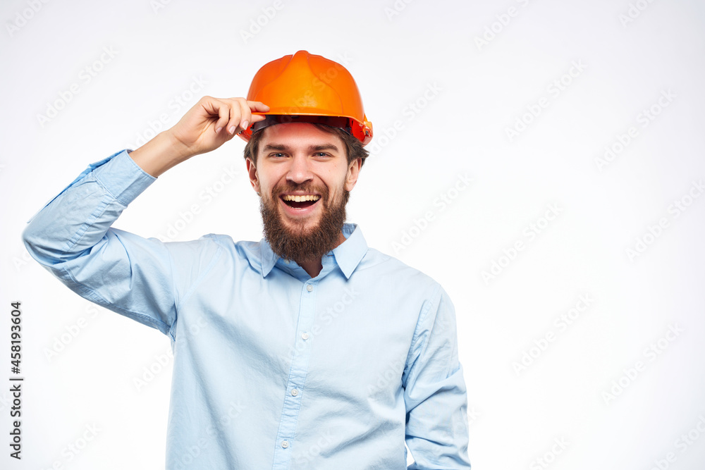 bearded man documents in hand and drawings protective uniform