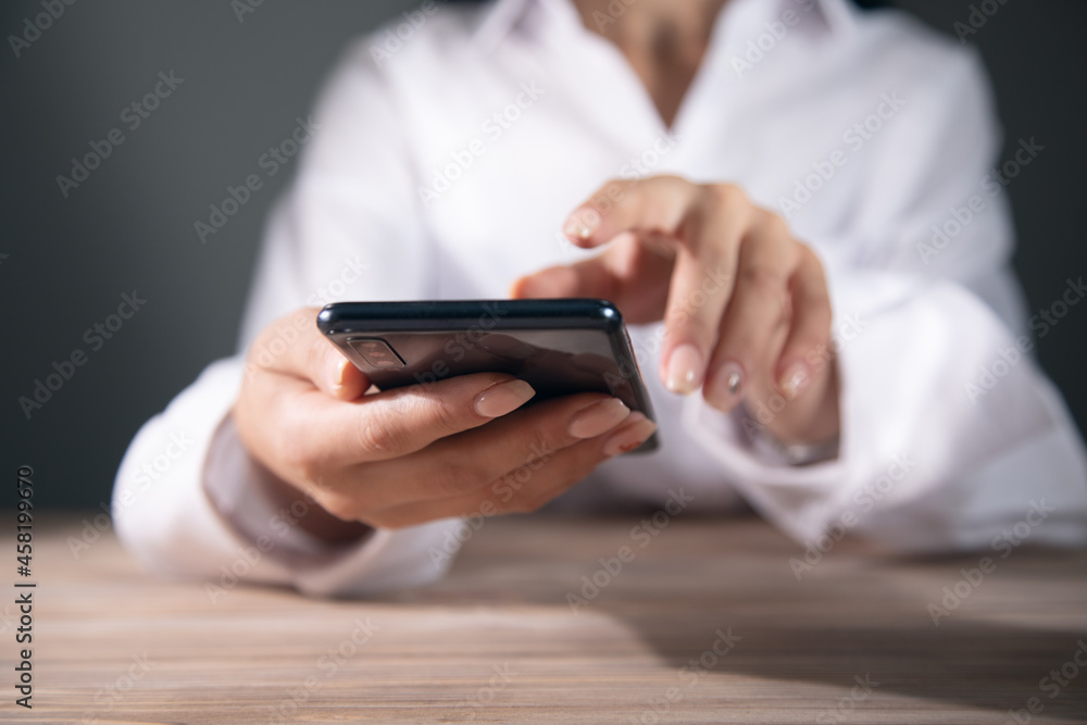 woman is using her smart phone