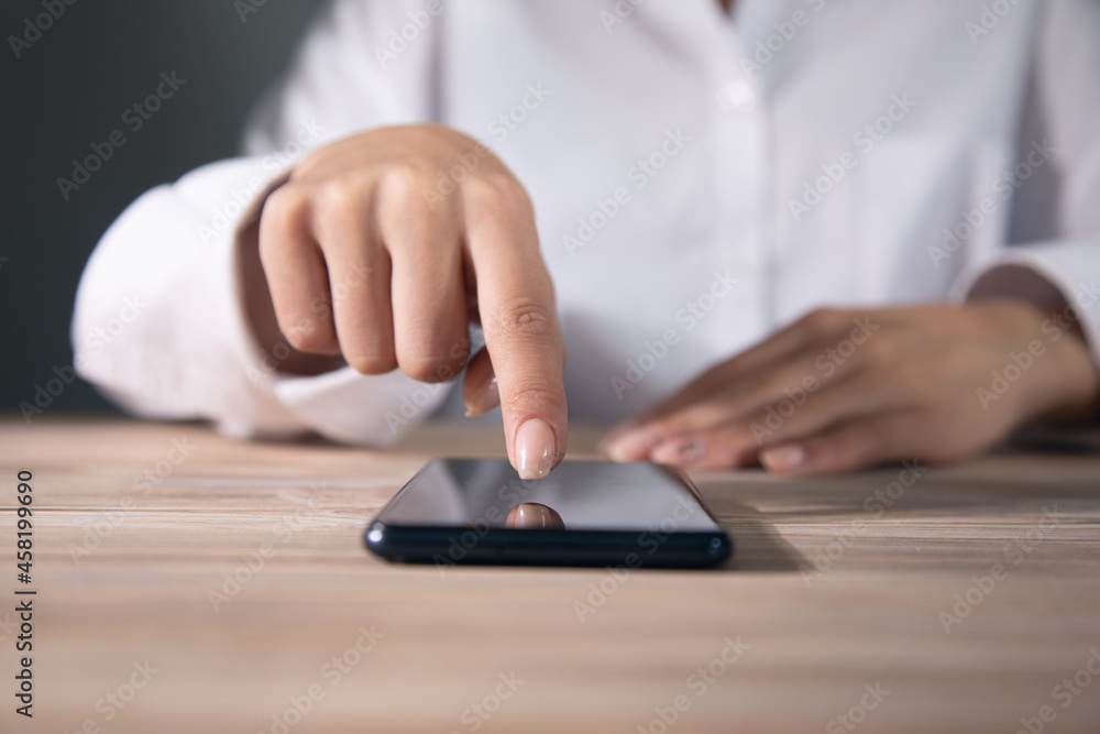 Fototapeta premium woman is using her smart phone