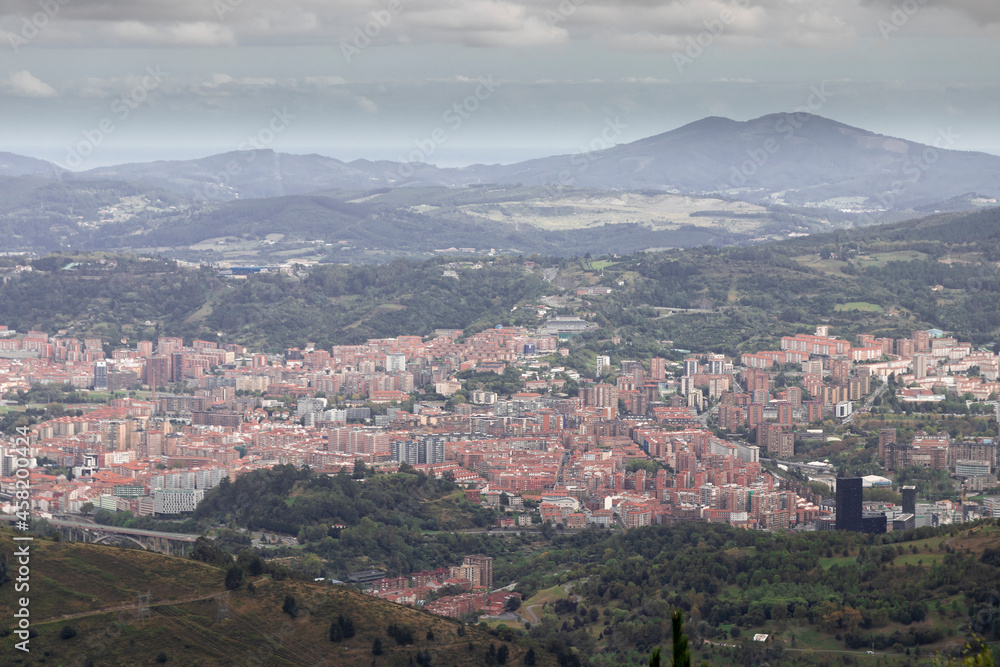 panoramic view of bilbao from mount artxanda on a cloudy day