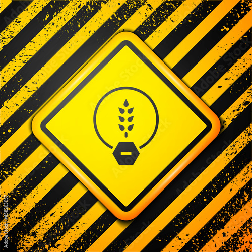 Black Gluten free grain icon isolated on yellow background. No wheat sign. Food intolerance symbols. Warning sign. Vector