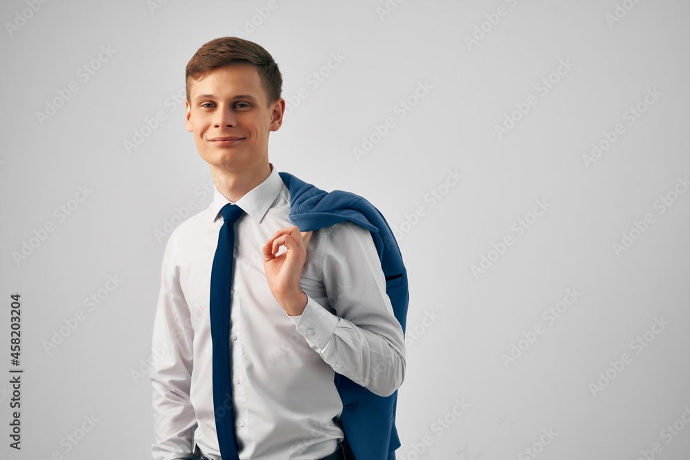 business man in shirt with tie jacket on his shoulders self-confidence success professional business man in shirt with tie jacket on his shoulders self-confidence success professional