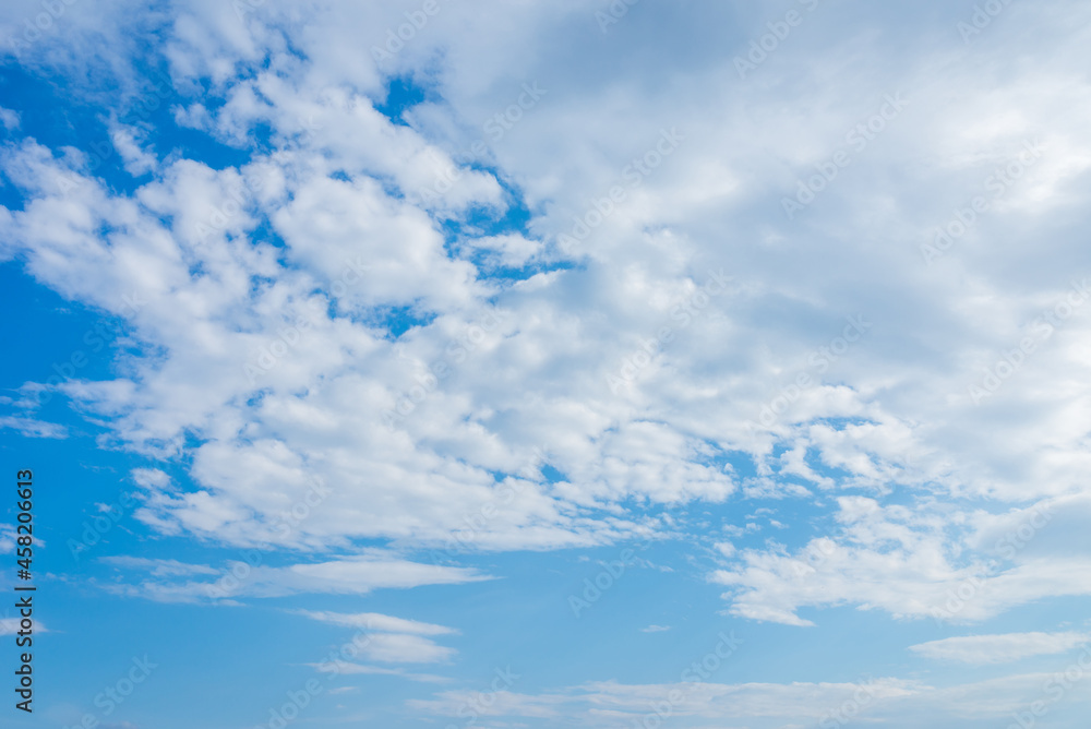 Blue sky white cloud scene.beautiful sparse clouds in the blue sky.White clouds in blue sky. Blue sky white cloud scene.beautiful sparse clouds in the blue sky.White clouds in blue sky.