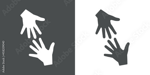 Concepto ayuda y solidaridad. Silueta aislada de 2 manos en fondo gris y fondo blanco