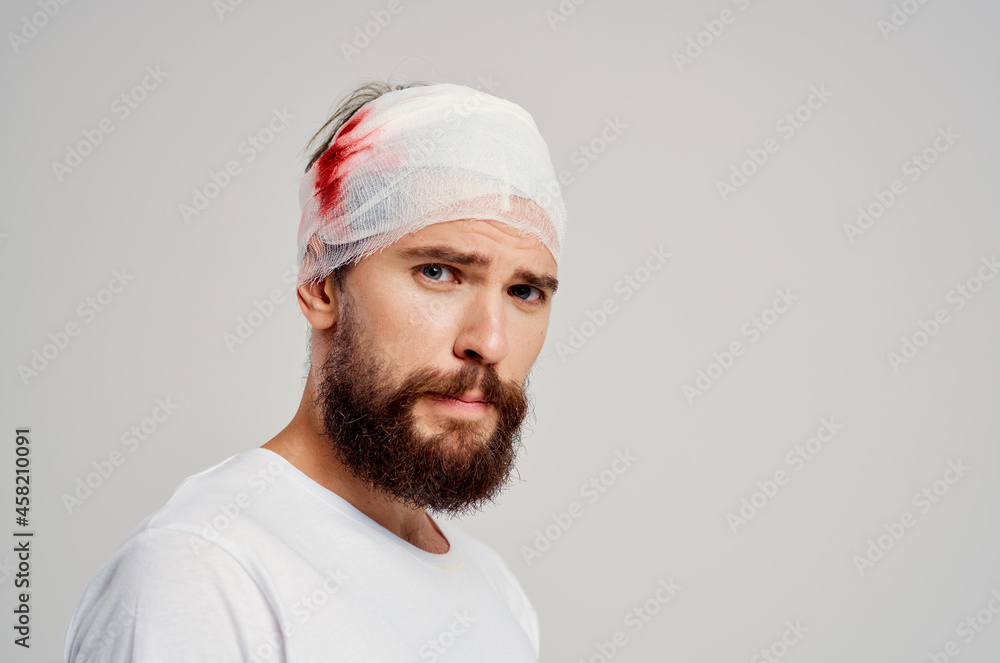 patient bandaged head and hand blood treatment patient bandaged head and hand blood treatment