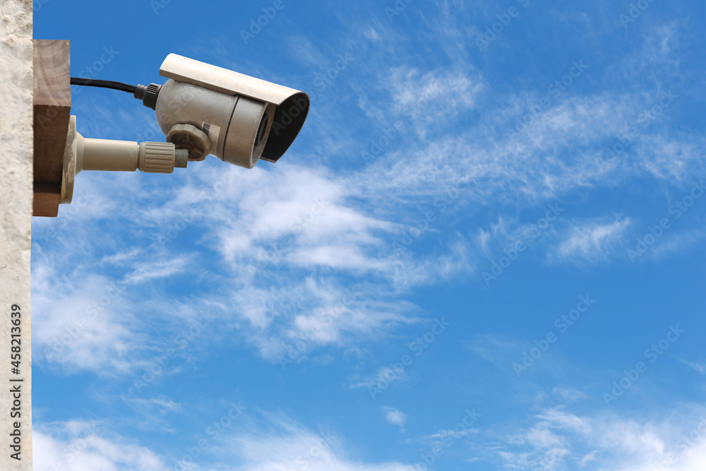 CCTV camera system on blue sky background. CCTV camera system on blue sky background.
