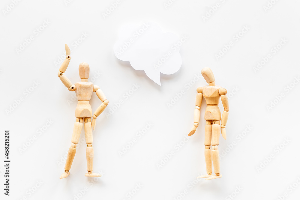 Personal communication concept. Two wooden mannequin figures connection