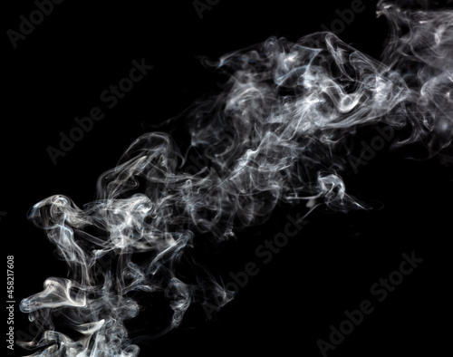 Smoke isolated on black background. © schankz