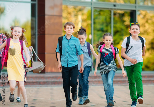 Group of kids going to school together.