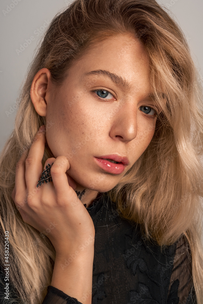 Obraz premium Woman with Natural Makeup and Freckles