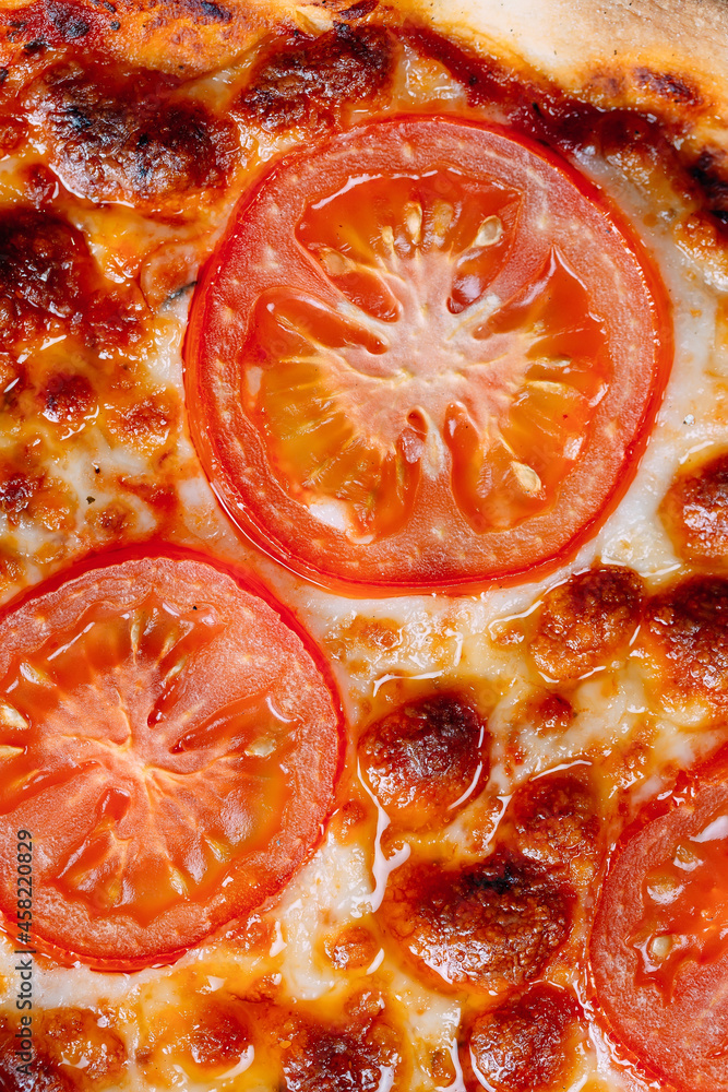 pizza Margarita close up with cheese and tomatoes. pizza Margarita close up with cheese and tomatoes.