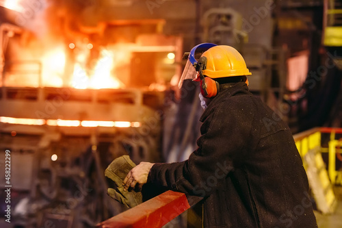 Workers in the steel mill.