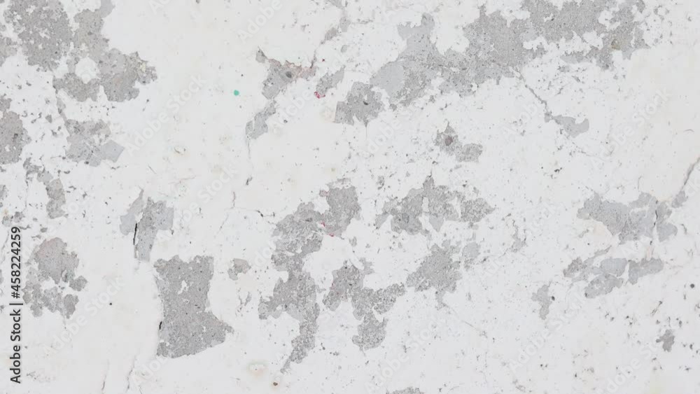 Old grunge texture of cracked wall. Video motion 4k footage with place for text Old grunge texture of cracked wall. Video motion 4k footage with place for text