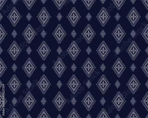 Seamless Geometric ethnic texture embroidery design with Dark Blue background design, skirt,wallpaper,clothing,Batik,fabric, white and yelllow triangle shapes Vector, illustration texture.eps
