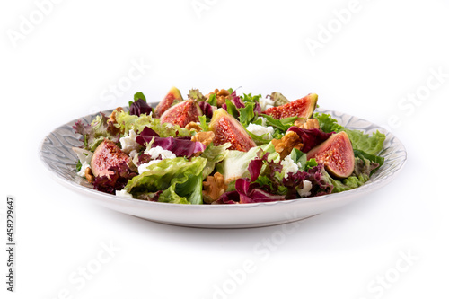 Figs salad with cheese and walnuts isolated on white background