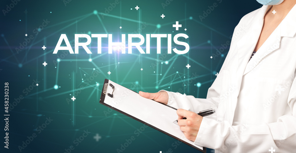 Doctor fills out medical record Doctor fills out medical record