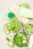 Homemade cosmetics with cucumber. Natural cream, sea salt, body lotion, and soap