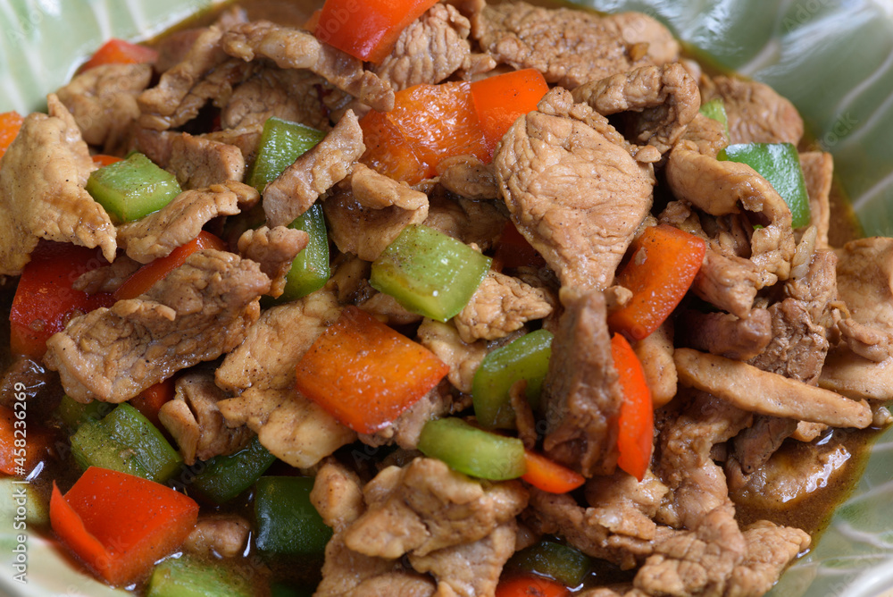 Close-up view stir fried pork with black pepper Close-up view stir fried pork with black pepper