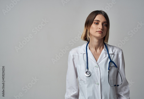 nurse in white coat stethoscope specialist hospital