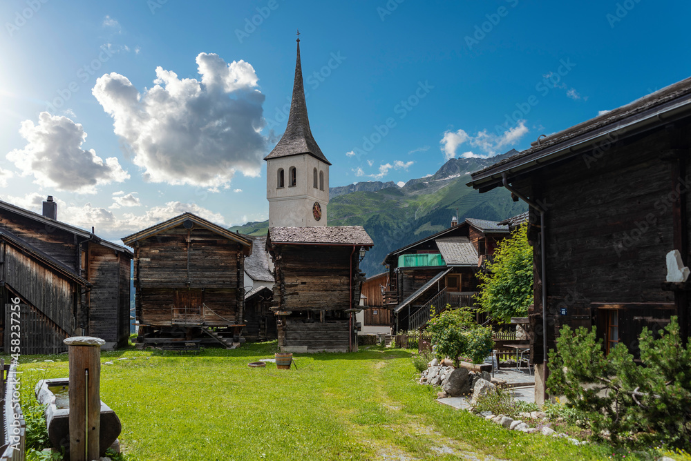 Historic village centre in Bellwald with tower of the parish church Historic village centre in Bellwald with tower of the parish church
