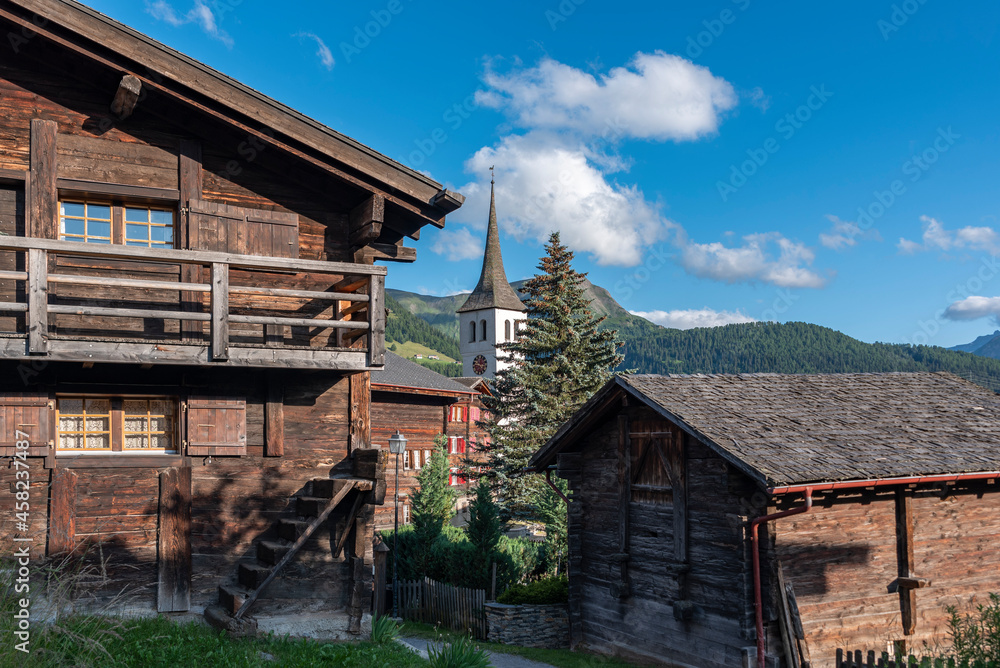Historic village centre in Bellwald with tower of the parish church Historic village centre in Bellwald with tower of the parish church
