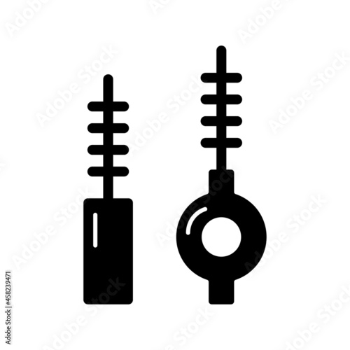 Interdental brushes black glyph icon. Cleaning out food particles and plaque. Preventing tooth disease risk. Keeping gums healthy. Silhouette symbol on white space. Vector isolated illustration