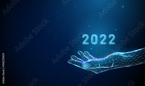 Abstract blue low poly giving hand with number 2022.