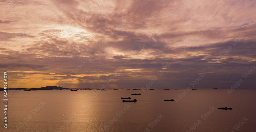Many cargo ships in the sea, view from the top
