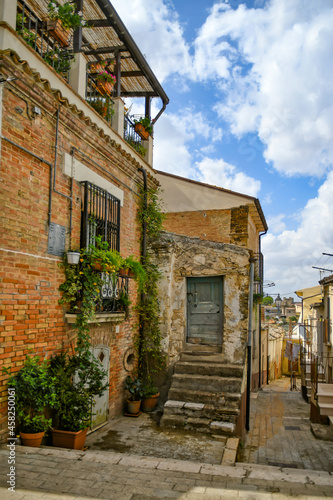 Fototapeta Naklejka Na Ścianę i Meble -  A narrow street in Lavello, an old town in Basilicata region, Italy.