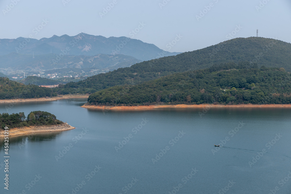 The view of the lake on a cloudy day in autumn The view of the lake on a cloudy day in autumn