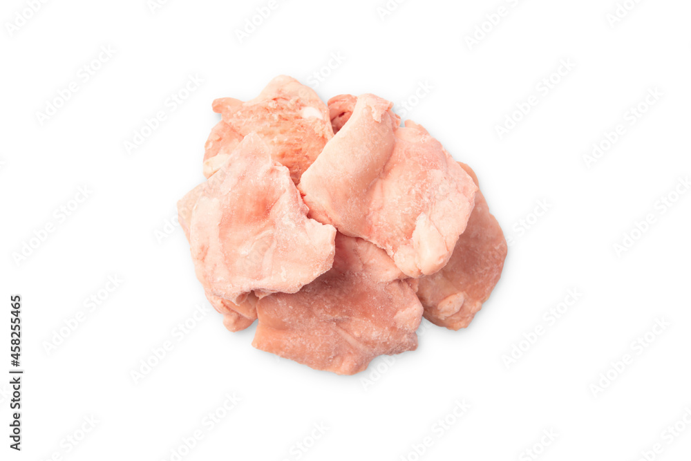 Raw frozen fillet isolated on white background.Frozen pieces of fresh chicken meat on a white plate.Frozen chicken fillet. Isolade. Raw frozen fillet isolated on white background.Frozen pieces of fresh chicken meat on a white plate.Frozen chicken fillet. Isolade.