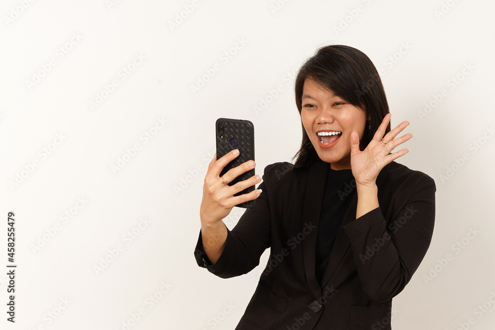 Smile Beautiful Asian Woman Wearing black suit video call using smartphone Isolated on white background Smile Beautiful Asian Woman Wearing black suit video call using smartphone Isolated on white background