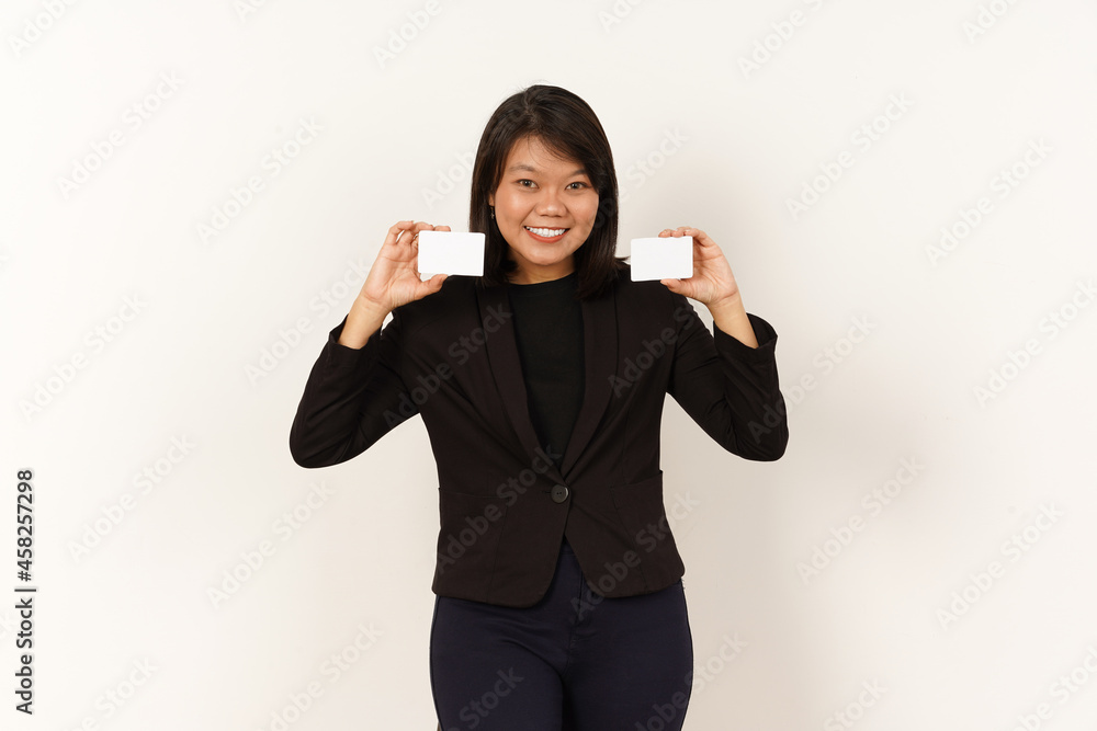 Beautiful Asian Woman Wearing black suit Holding and showing blank credit card Isolated on white background