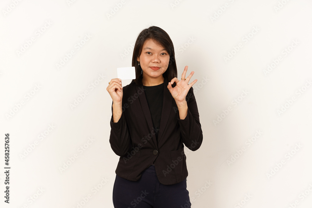 Beautiful Asian Woman Wearing black suit Holding and showing blank credit card and showing ok sign Isolated on white background Beautiful Asian Woman Wearing black suit Holding and showing blank credit card and showing ok sign Isolated on white background