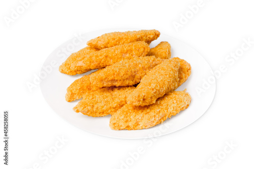 Fast homemade food.Fast food.Chicken breaded nuggets on a white plate.Raw chicken fillet inner, sprinkled with bright breading.