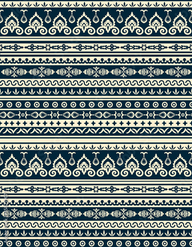 Tribal boho, hand drawn repeat elements seamless pattern. Vertical, vector paisley and damask illustrations all over print on dark blue background.
