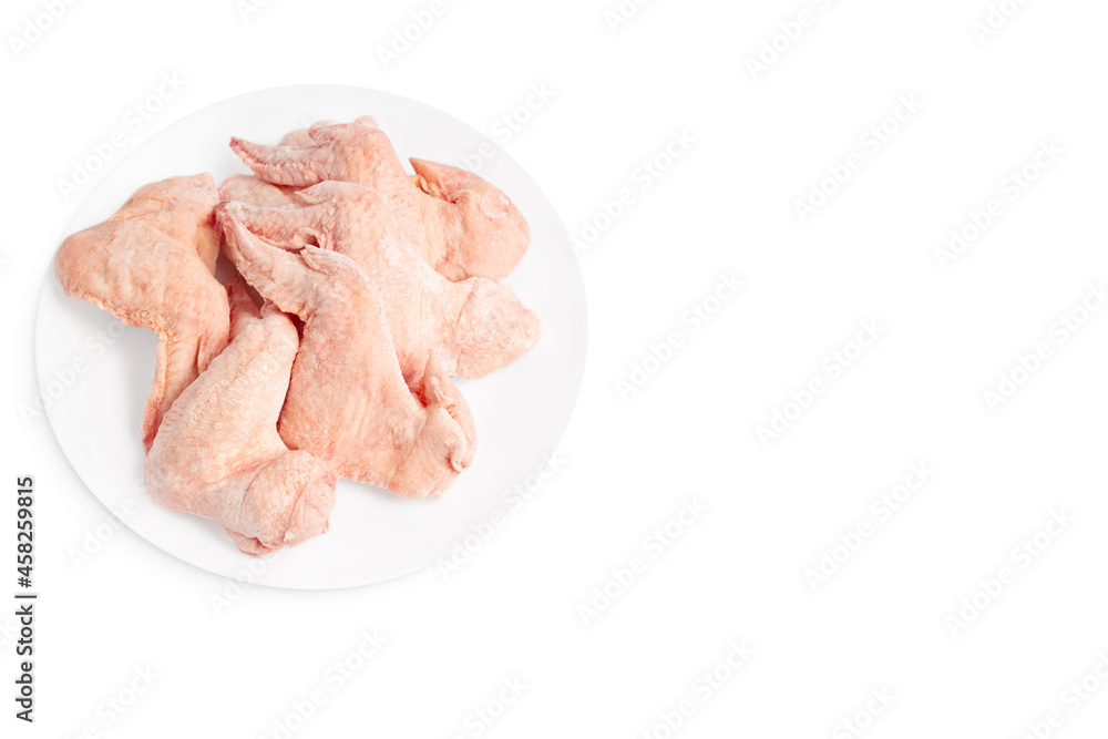 Raw frozen wings for a supermarket.Raw wings on a white background, isolade.Close up, space for text, copy space. Raw frozen wings for a supermarket.Raw wings on a white background, isolade.Close up, space for text, copy space.